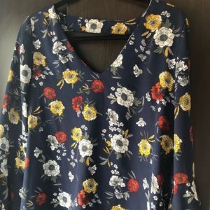 Navy floral blouse with bell sleeves